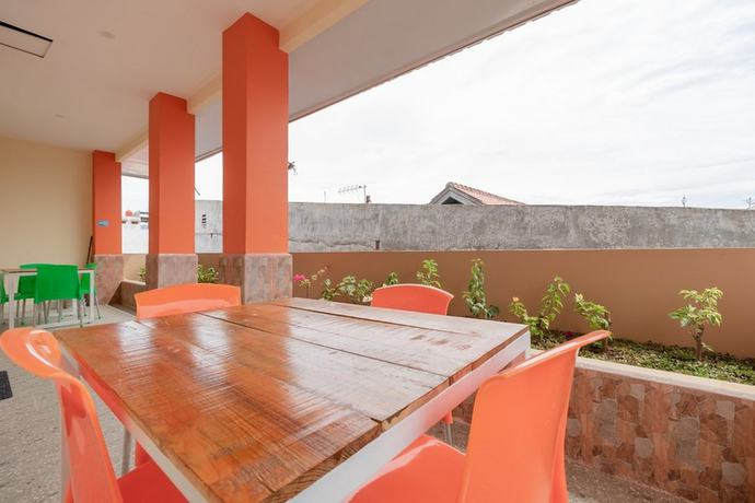 Imagen del bar/restaurante del Hotel RedDoorz Syariah @ Panglima Polem Aceh. Foto 5