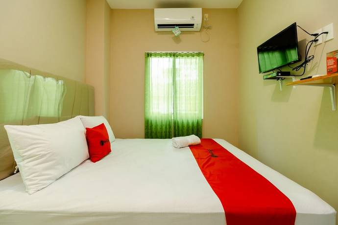 Imagen de la habitación del Hotel RedDoorz Syariah @ Panglima Polem Aceh. Foto 12