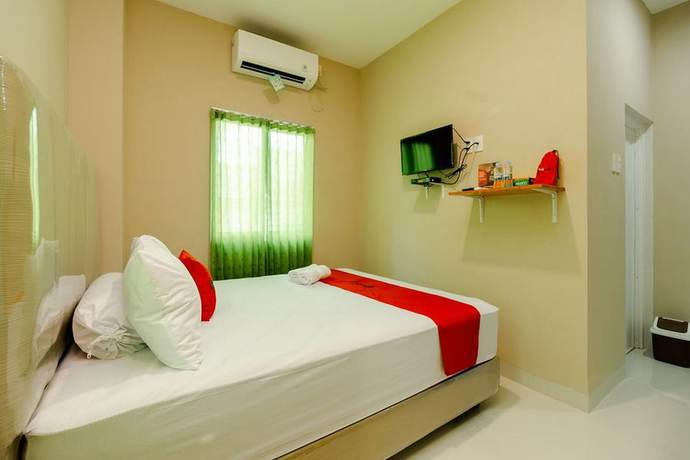 Imagen de la habitación del Hotel RedDoorz Syariah @ Panglima Polem Aceh. Foto 13