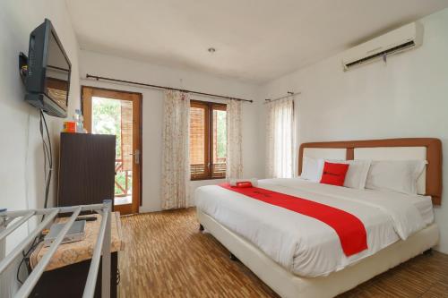 Imagen de la habitación del Hotel RedDoorz Syariah @ Sumur Tiga Beach Sabang. Foto 8