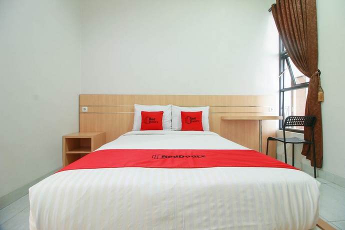 Imagen de la habitación del Hotel RedDoorz Syariah near Universitas Jenderal Soedirman. Foto 6