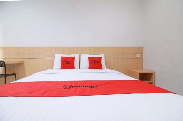Imagen de la habitación del Hotel RedDoorz Syariah near Universitas Jenderal Soedirman. Foto 11