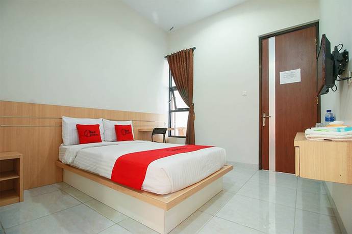 Imagen de la habitación del Hotel RedDoorz Syariah near Universitas Jenderal Soedirman. Foto 12