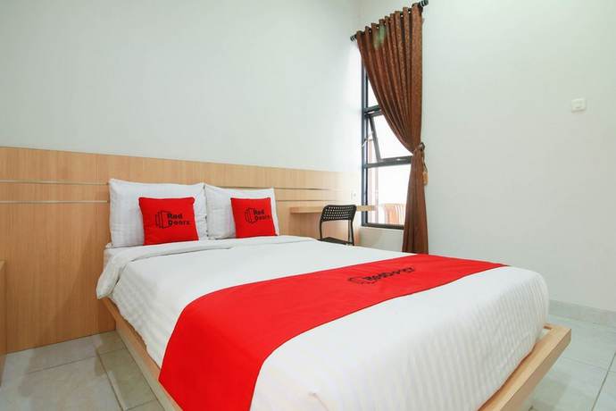Imagen de la habitación del Hotel RedDoorz Syariah near Universitas Jenderal Soedirman. Foto 14