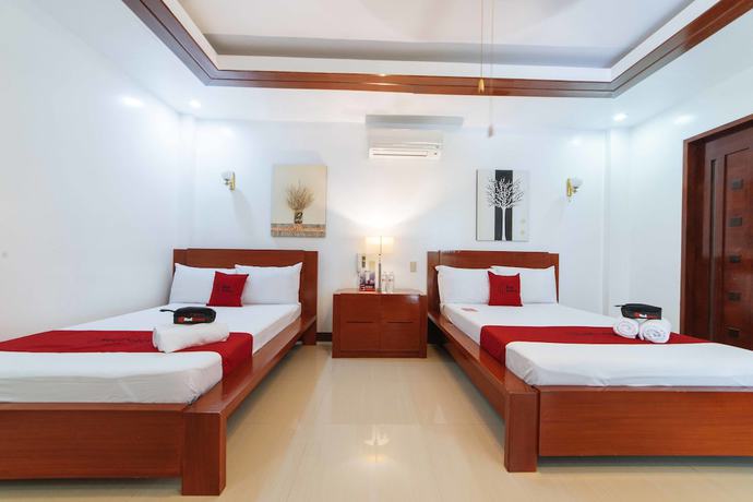 Imagen de la habitación del Hotel RedDoorz @ Teofely Garden Tagaytay. Foto 12