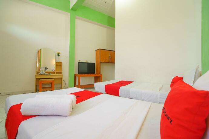 Imagen general del Hotel RedDoorz @ Tuktuk Danau Toba. Foto 14