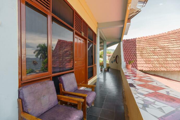 Imagen general del Hotel RedDoorz @ Tuktuk Danau Toba. Foto 33