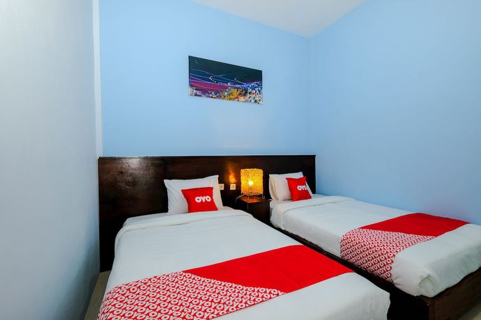 Imagen de la habitación del Hotel RedDoorz at Hening Homestay. Foto 9