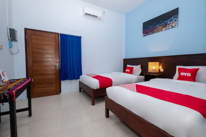 Imagen de la habitación del Hotel RedDoorz at Hening Homestay. Foto 14