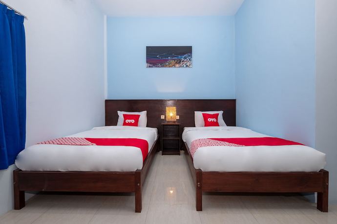 Imagen de la habitación del Hotel RedDoorz at Hening Homestay. Foto 16