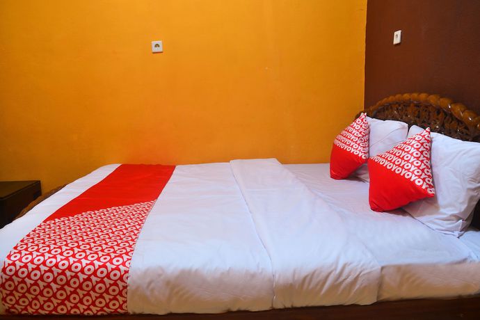Imagen de la habitación del Hotel RedDoorz at Rita Guesthouse Pangandaran. Foto 5