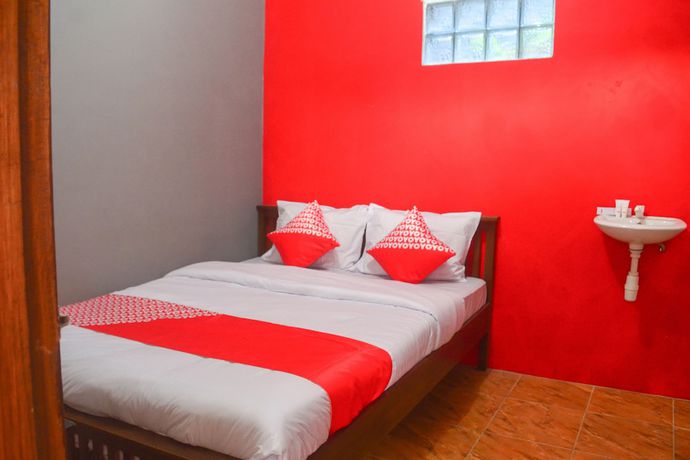 Imagen de la habitación del Hotel RedDoorz at Rita Guesthouse Pangandaran. Foto 6