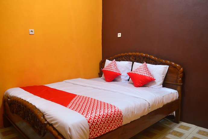 Imagen de la habitación del Hotel RedDoorz at Rita Guesthouse Pangandaran. Foto 8