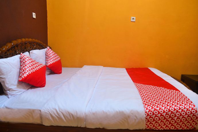 Imagen de la habitación del Hotel RedDoorz at Rita Guesthouse Pangandaran. Foto 16