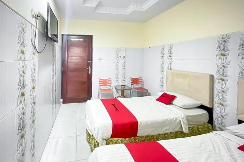 Imagen de la habitación del Hotel RedDoorz near Grage Mall Cirebon. Foto 19