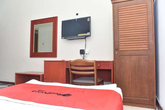 Imagen de la habitación del Hotel RedDoorz near Kampung Warna Warni. Foto 10