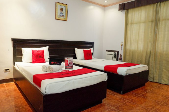 Imagen de la habitación del Hotel RedDoorz near Maribago Barangay Hall. Foto 2