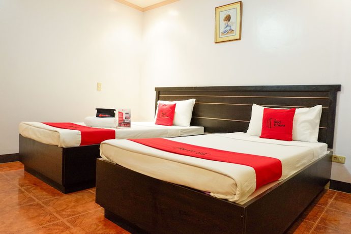 Imagen de la habitación del Hotel RedDoorz near Maribago Barangay Hall. Foto 6