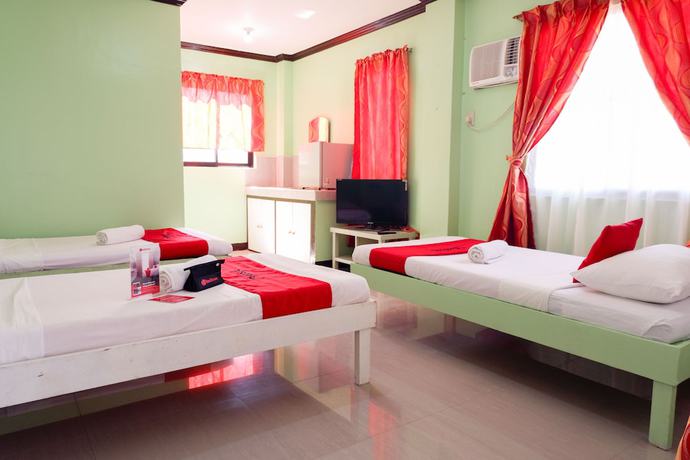 Imagen de la habitación del Hotel RedDoorz near Maribago Barangay Hall. Foto 9