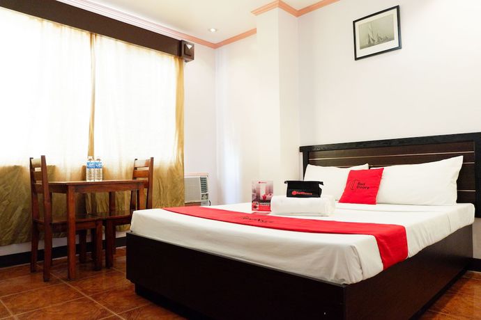 Imagen de la habitación del Hotel RedDoorz near Maribago Barangay Hall. Foto 11
