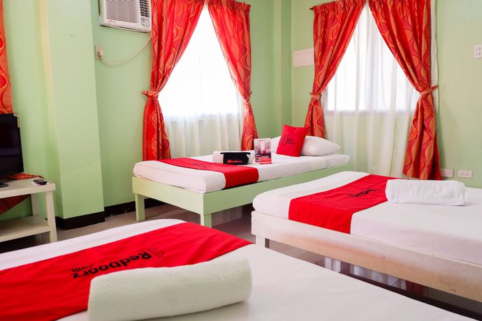Imagen de la habitación del Hotel RedDoorz near Maribago Barangay Hall. Foto 16