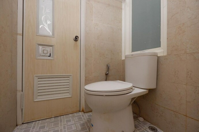 Imagen de la habitación del Hotel RedDoorz near Plaza Simpang Lima. Foto 16
