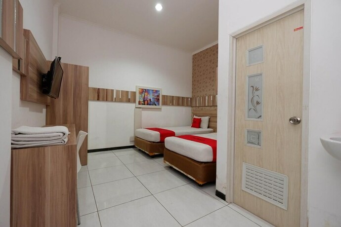 Imagen de la habitación del Hotel RedDoorz near Plaza Simpang Lima. Foto 17