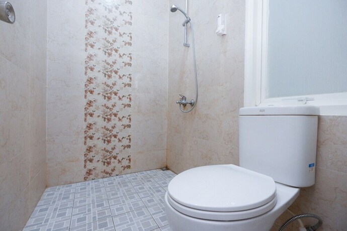 Imagen de la habitación del Hotel RedDoorz near Plaza Simpang Lima. Foto 20