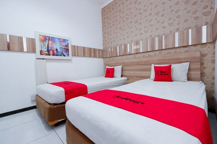 Imagen de la habitación del Hotel RedDoorz near Plaza Simpang Lima. Foto 24