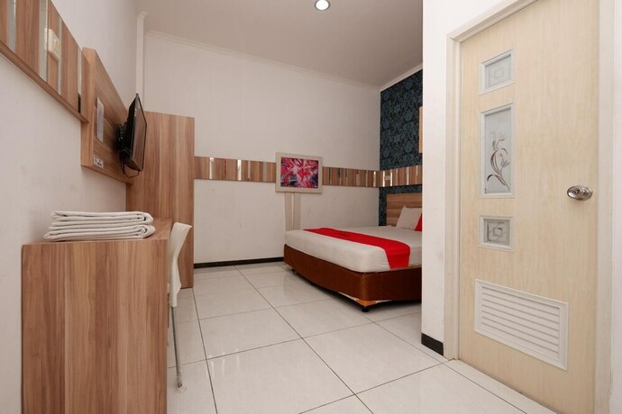 Imagen de la habitación del Hotel RedDoorz near Plaza Simpang Lima. Foto 25