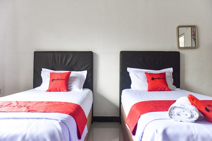 Imagen de la habitación del Hotel RedDoorz near Sultan Hasanuddin Airport 2. Foto 12