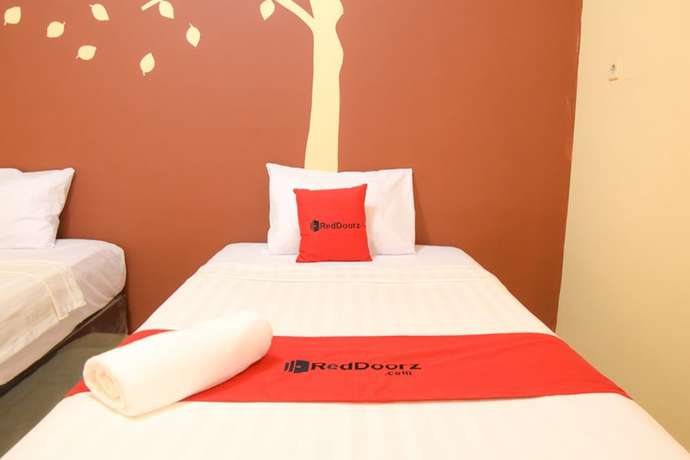 Imagen de la habitación del Hotel RedDoorz near Terminal A Adisucipto Airport. Foto 9