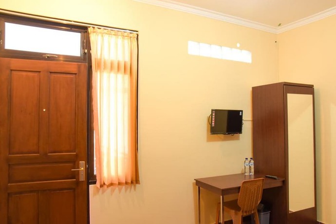 Imagen de la habitación del Hotel RedDoorz near Terminal A Adisucipto Airport. Foto 13