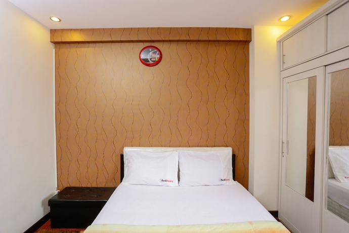 Imagen de la habitación del Hotel RedLiving Apartemen The Suites Metro - Mary Tower E. Foto 3