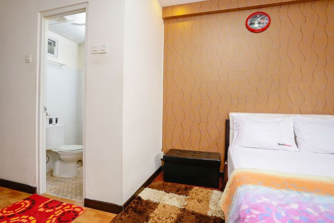 Imagen de la habitación del Hotel RedLiving Apartemen The Suites Metro - Mary Tower E. Foto 8