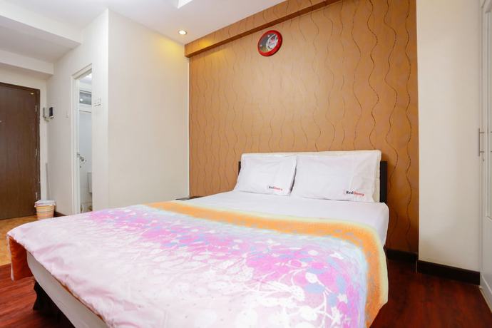 Imagen de la habitación del Hotel RedLiving Apartemen The Suites Metro - Mary Tower E. Foto 15