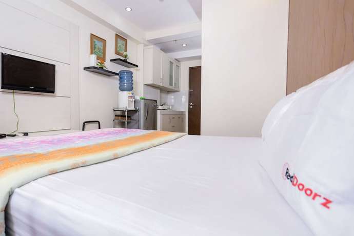 Imagen de la habitación del Hotel RedLiving Apartemen The Suites Metro - Mary Tower E. Foto 17
