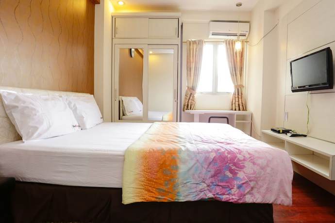 Imagen de la habitación del Hotel RedLiving Apartemen The Suites Metro - Mary Tower E. Foto 18