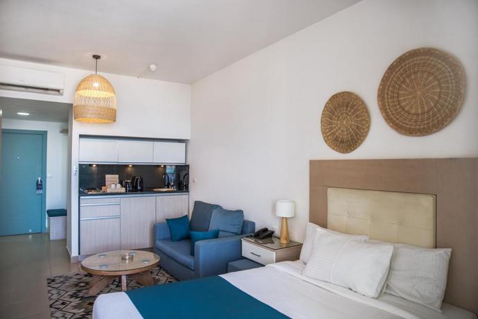 Imagen de la habitación del Hotel Redcon Suites. Foto 5