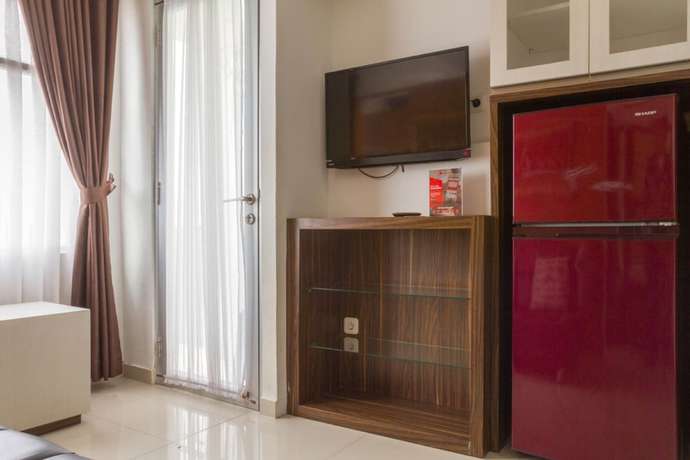 Imagen de la habitación del Hotel Reddoorz Apartment @ Jarrdin Cihampelas. Foto 3