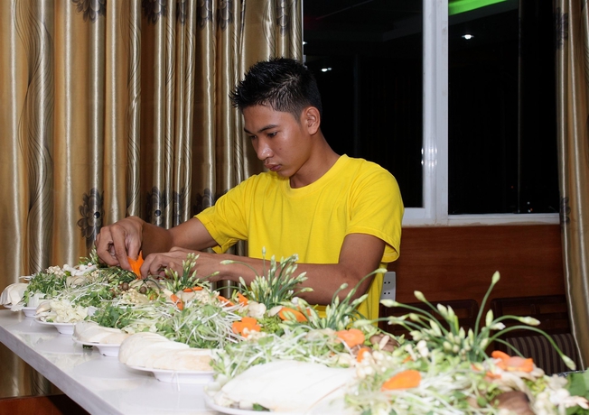 Imagen del bar/restaurante del Hotel Reddoorz Near Gia Dinh Park. Foto 5