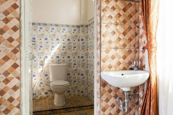 Imagen de la habitación del Hotel Reddoorz Near Jimbaran Market Bandungan. Foto 33