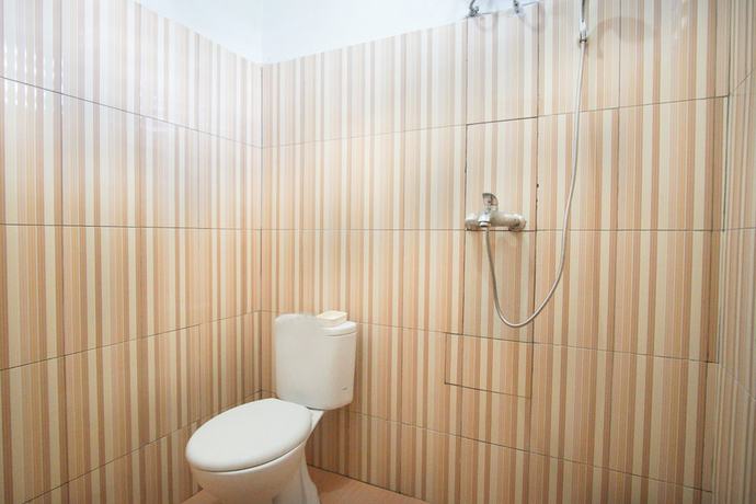 Imagen de la habitación del Hotel Reddoorz Near Mall Abepura. Foto 9