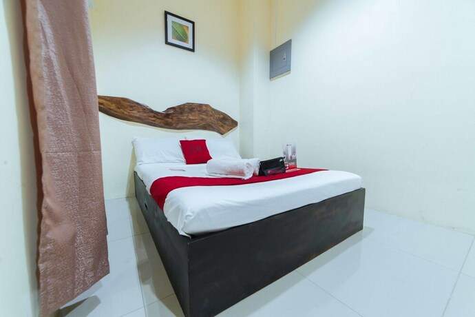 Imagen de la habitación del Hotel Reddoorz Near New Government Center. Foto 19