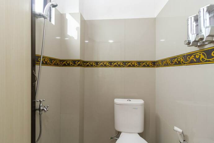 Imagen general del Hotel Reddoorz Near Rsu Suaka Insan. Foto 4