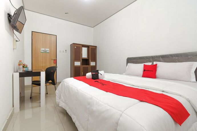 Imagen de la habitación del Hotel Reddoorz Near Rsu Suaka Insan. Foto 28