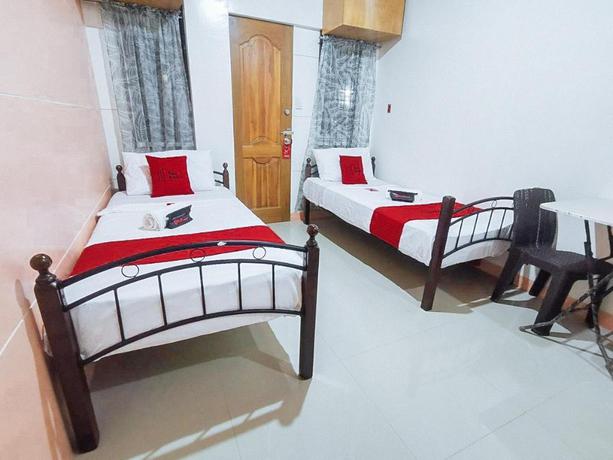 Imagen de la habitación del Hotel Reddoorz Near Sgm Condotel Villa Beach Iloilo. Foto 6