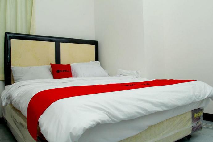 Imagen de la habitación del Hotel Reddoorz Near Telkom Corporate University. Foto 2