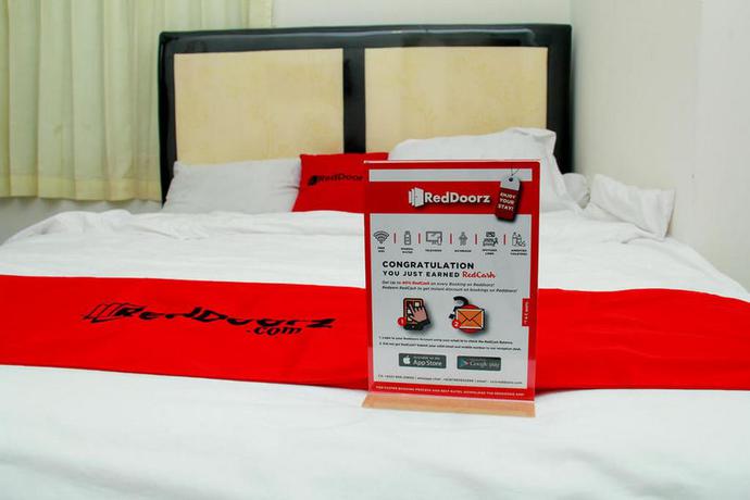 Imagen de la habitación del Hotel Reddoorz Near Telkom Corporate University. Foto 6