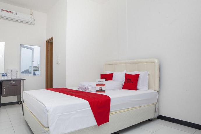 Imagen de la habitación del Hotel Reddoorz Near Telkom Corporate University. Foto 12